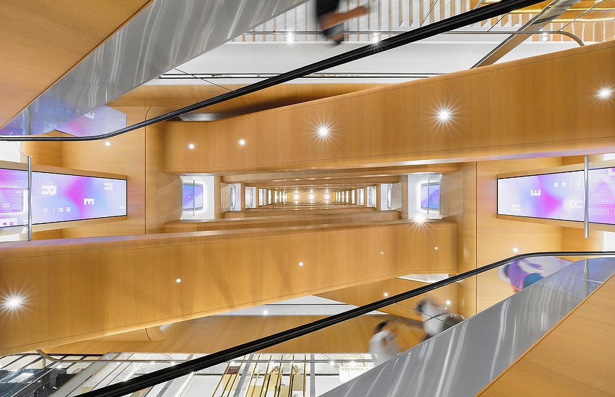 A room with a few people in it.